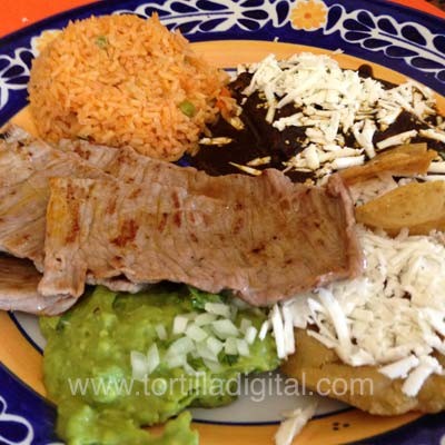 Carne a la tampiqueña con enchiladas